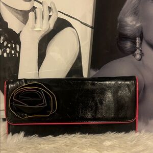 Steve Madden Elegant Black Clutch with Red Accents